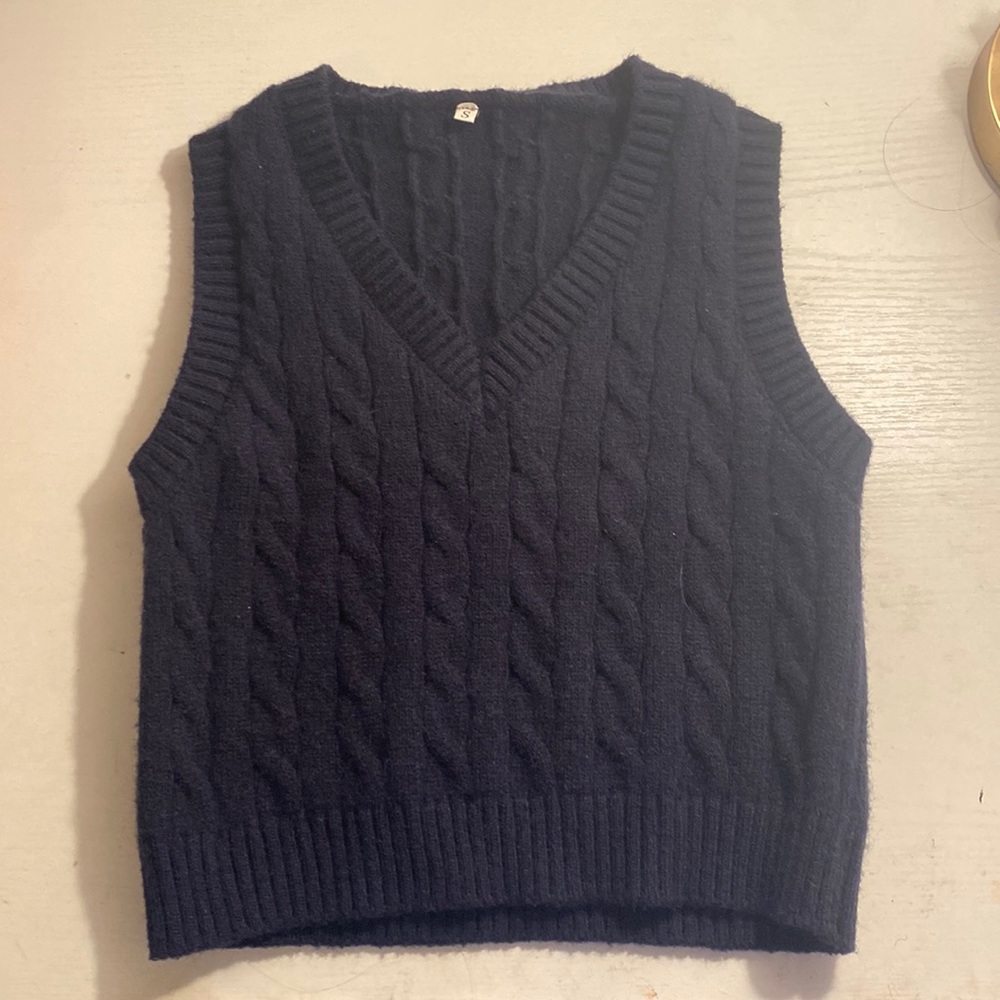 Black sweater vest